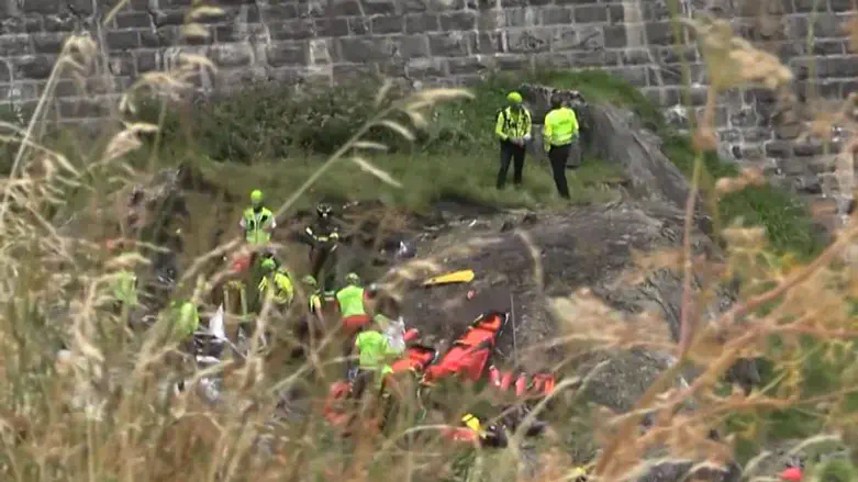Two killed after aircraft hits cables and erupts in flames