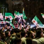 Syria’s Kurds demonstrate in multiple cities, government announces curfew