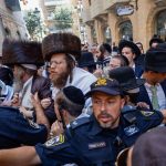 Haredi demonstrators, counterprotestors clash at sixth consecutive Shabbat protest of Basimta Cafe