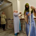 Half of Afghan women rarely leave home as Taliban restrictions deepen, UN agency says