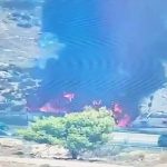 Firefighters work to extinguish bus fire on Highway 1 between Jerusalem, Ma’aleh Adumim