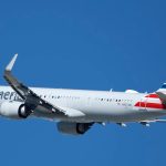 Passenger burned after laptop computer catches fire aboard American Airlines flight to Dallas