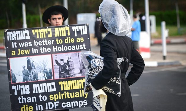 Haredi anti-draft protesters block roads at IDF induction center for second day