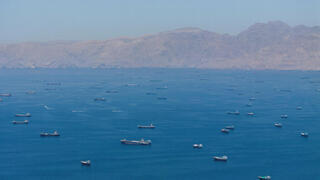 Iran says Hormuz deal reached with Oman, warns strait stays shut unless US accepts terms