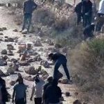 Settlers block roads as Israeli forces move to evacuate illegal outpost besieging Palestinian homes