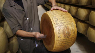 Italy’s ‘Fort Knox of cheese’ feels the heat as climate change drives up costs and risks