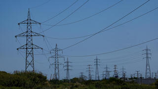 Southern Israelis endure daylong blackout after masked gunmen shoot transformer, threaten crews