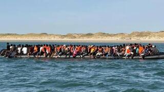 ‘Proof of an invasion’: Record 230 migrants reach England on single boat