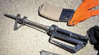 Doctor tries to hide M16, arrested after crashing into police car during chase | Watch