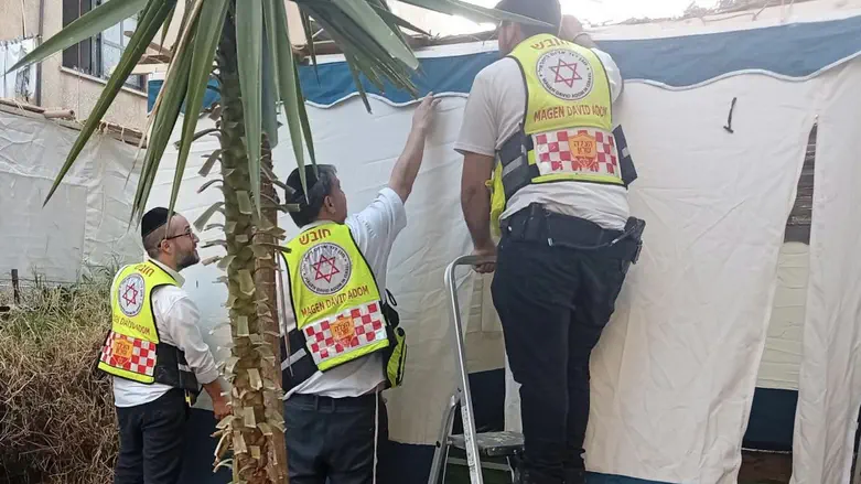One mitzvah leads to another: MDA team treats woman, then builds her sukkah