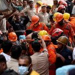 Multi-story building collapses in India’s Delhi, police rescue at least six people