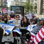 Israeli, Jewish protesters rally against NYC ‘NAZA’ screening, display October 7 massacre footage