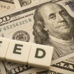 U.S. dollar stays strong as markets price In another Fed hike