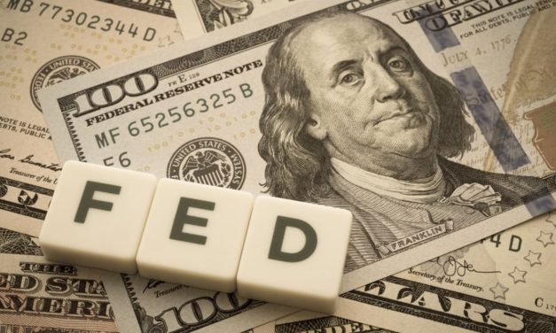 U.S. dollar stays strong as markets price In another Fed hike