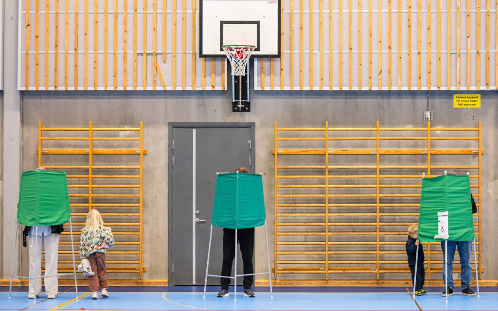 Sweden goes to the polls as hard-right party bids for ministerial roles in government