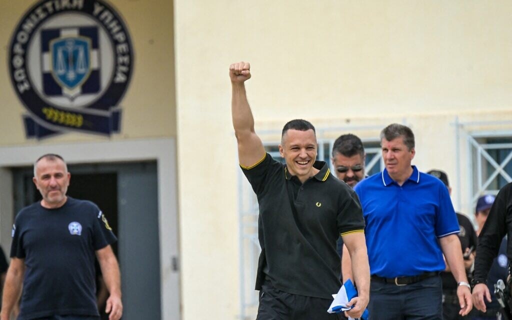 Prominent Greek neo-Nazi exits prison vowing he’ll return to politics