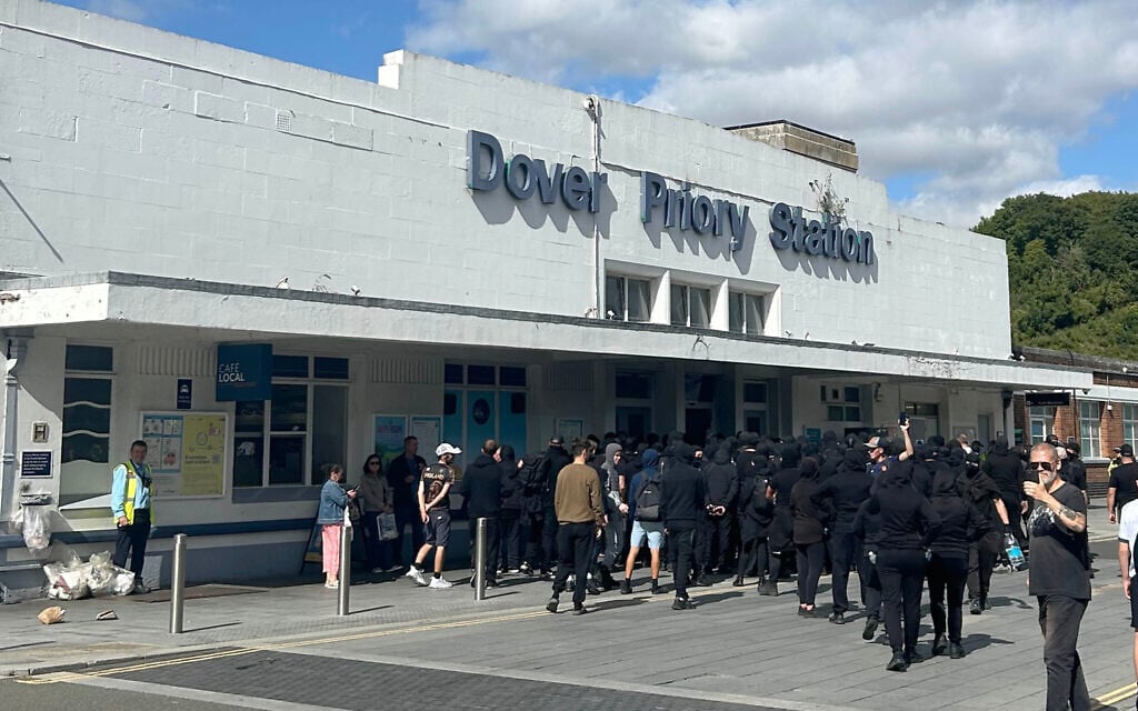 Masked anti-immigration protesters block roads to Britain’s busiest ferry port