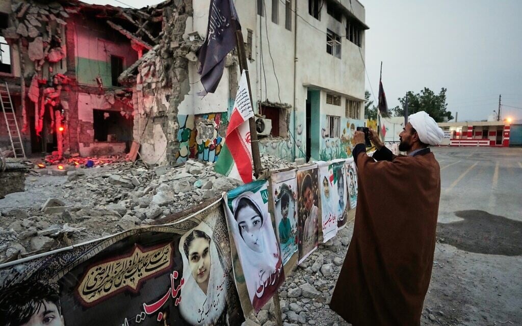 Families grieve in ruins of Iranian school where US strike killed dozens of children