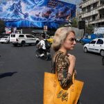 Iran hesitant to enforce mandatory headscarf law as war and economic pressures mount
