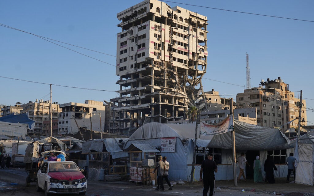 Fatal building collapse highlights dangers plaguing Gaza nearly a year after ceasefire