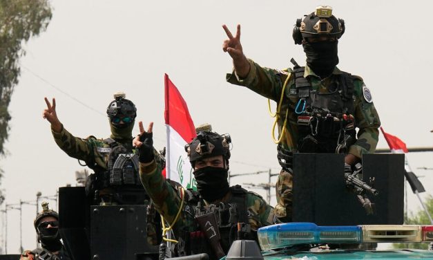 Iraqis celebrate final US troop withdrawal as government takes charge of security