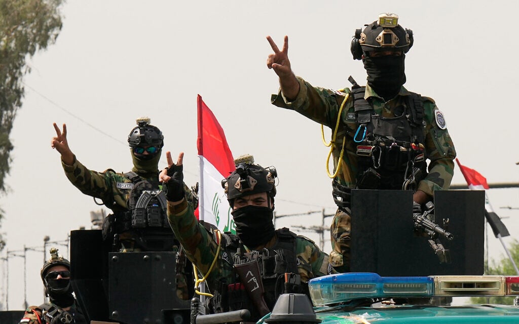 Iraqis celebrate final US troop withdrawal as government takes charge of security