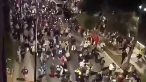 Thousands of migrants surge through Ceuta as Spain moves them to new tent camp | Watch