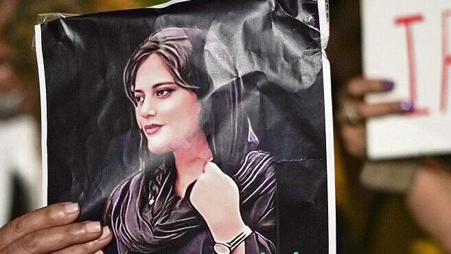 Women race without hijabs in Tehran as pro-regime rally draws 300,000 participants