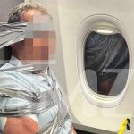 Watch: Drunk American Airlines passenger duct-taped to seat after alleged racist outburst
