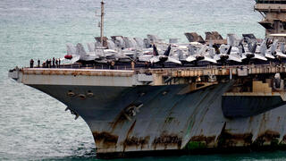 Iran tests Trump with Gulf strikes as US touts Hormuz oil surge and battered carrier raises alarms