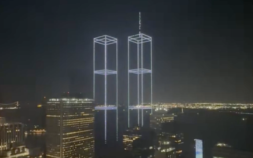 9/11 families, responders recreate Twin Towers in light over New York Harbor