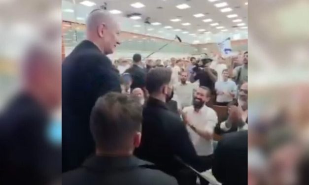 Netanyahu nods and smiles as yeshiva students sing of taking vengeance on Palestinians
