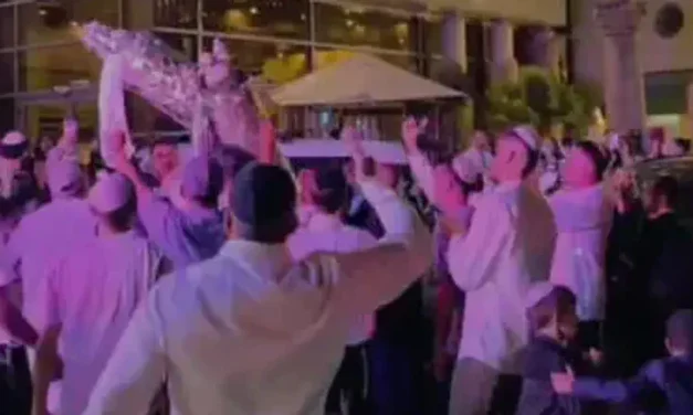 Three years later: Nova massacre survivors dance with Torah scrolls