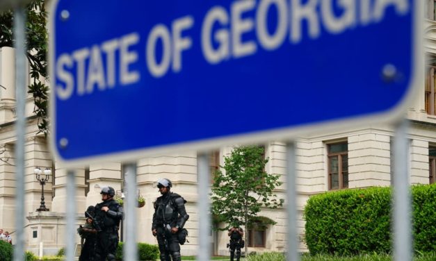 Georgia, US, block party shooting kills two, wounds dozens, officials say