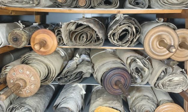 Saved from Nazi-occupied Prague, thousands of Torah scrolls find new life through a Satmar scribe