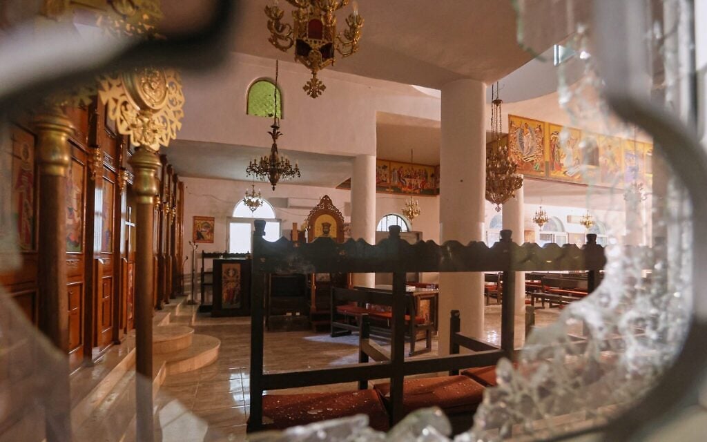 Death toll up to 9 as survivor of Jordan church attack describes people crawling for their lives