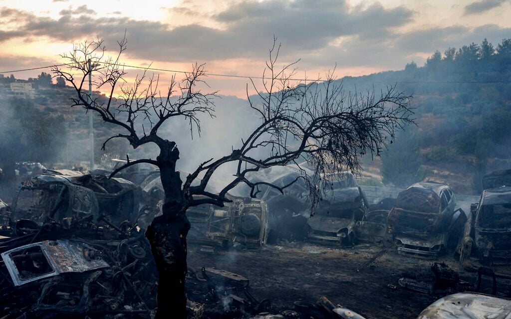 IDF says settlers raid Palestinian village, vandalize building and set fire to shed