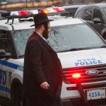Woman faces hate crime charges for stabbings of two Jewish men