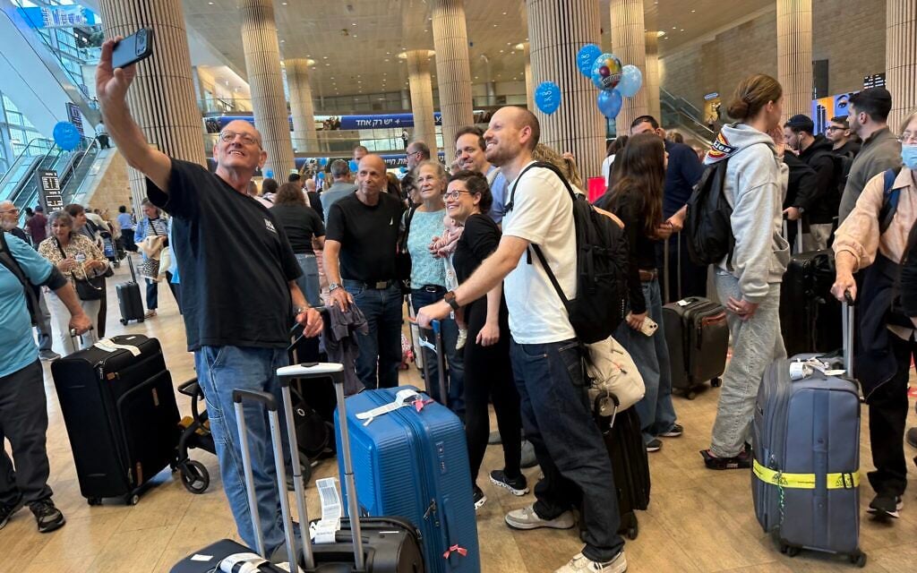 Carnival atmosphere at Ben Gurion Airport as thousands of Israelis come home to vote