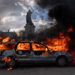 A synagogue and Jewish-owned shops damaged in French riots