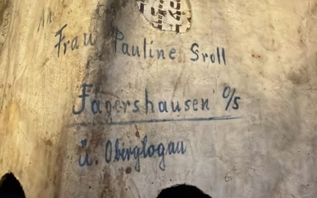 Norwegian auction of Nazi-defaced Holocaust-era Torah fragment sparks outcry, then intervention