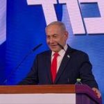 Netanyahu vows to confront Iran threat alongside Trump as exit polls show no clear majority
