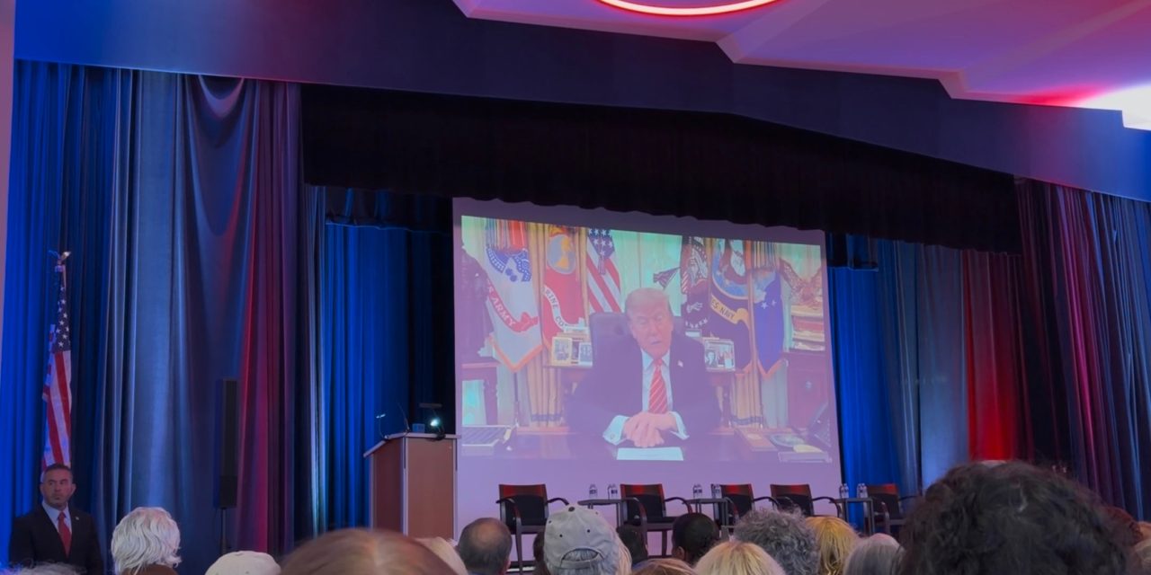 Trump cheered in video address to Michigan synagogue
