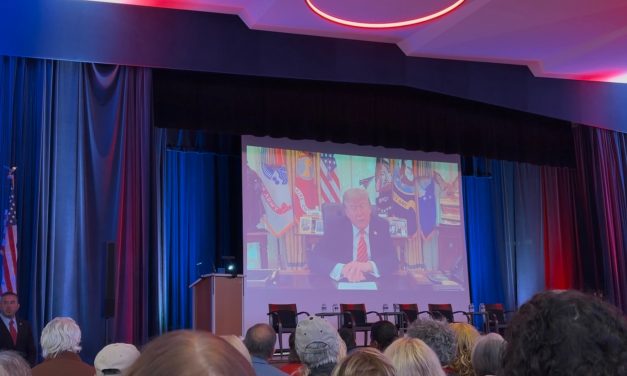 Trump cheered in video address to Michigan synagogue